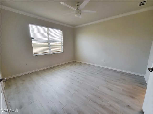 empty room with light wood-type flooring, ceiling fan, and ornamental molding