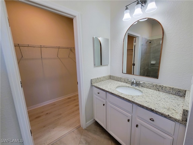 bathroom featuring hardwood / wood-style floors and vanity