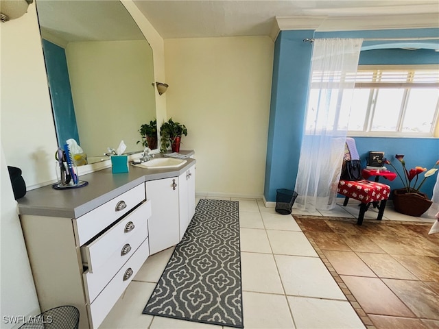 bathroom with vanity and tile patterned floors