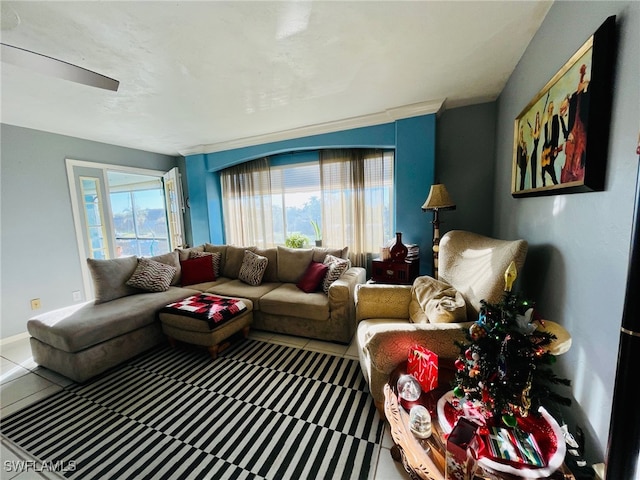 living room with crown molding and a healthy amount of sunlight