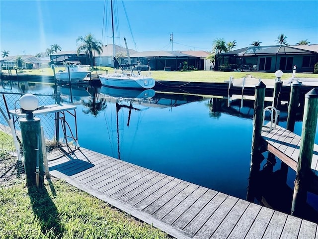 dock area featuring a water view