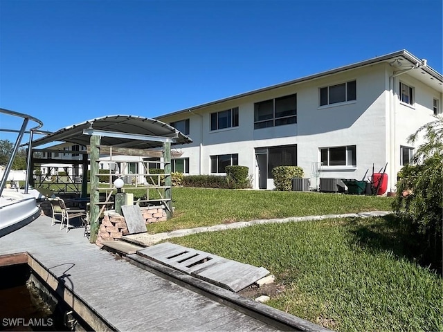 view of home's community with a lawn