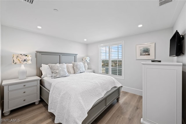 bedroom featuring light wood-type flooring