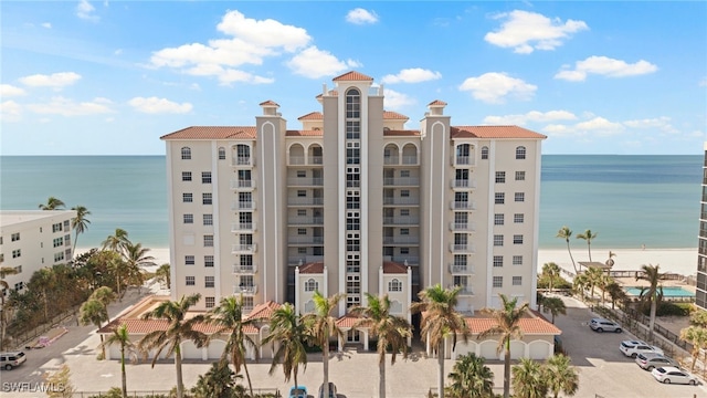 view of building exterior with a water view