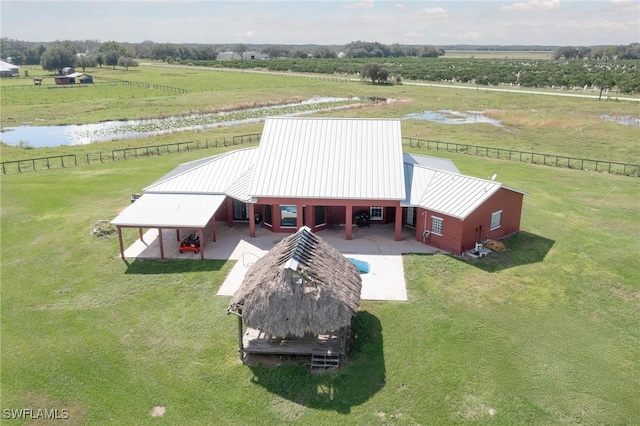 bird's eye view featuring a rural view and a water view