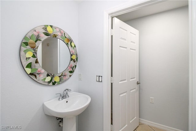 bathroom featuring sink and tile patterned floors