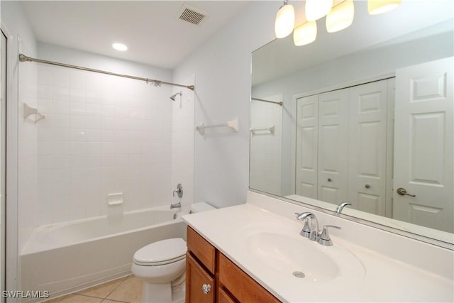 full bathroom with vanity, toilet, tile patterned floors, and shower / bathing tub combination