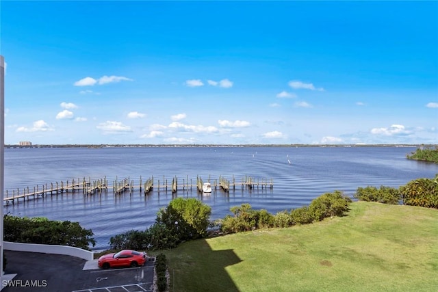 water view featuring a dock