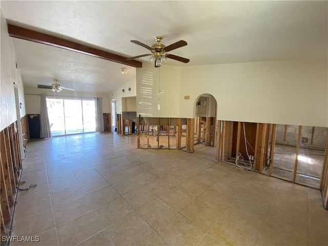 interior space with ceiling fan, lofted ceiling with beams, and light tile patterned floors