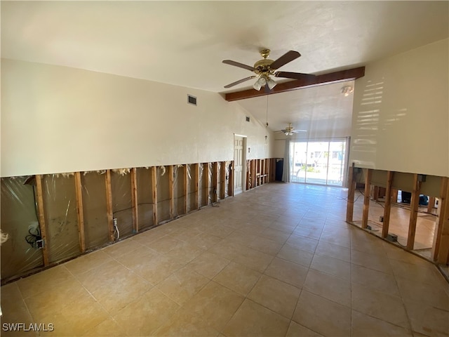 unfurnished room with ceiling fan and lofted ceiling with beams