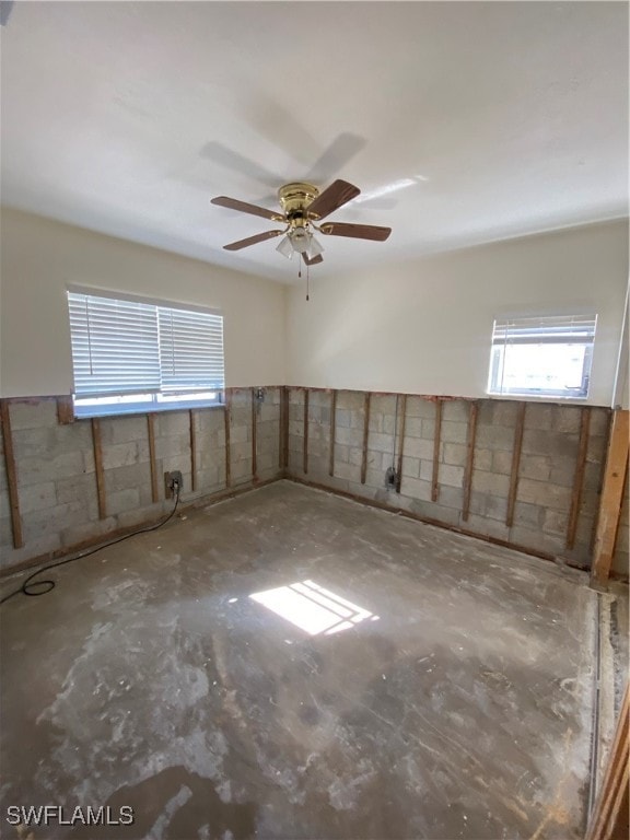 spare room with ceiling fan