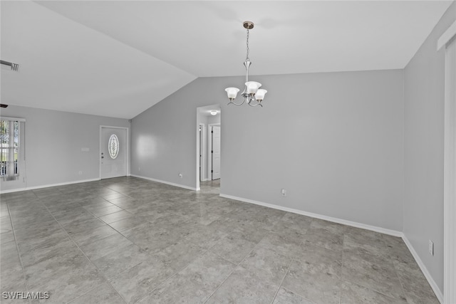 unfurnished room with a chandelier and vaulted ceiling