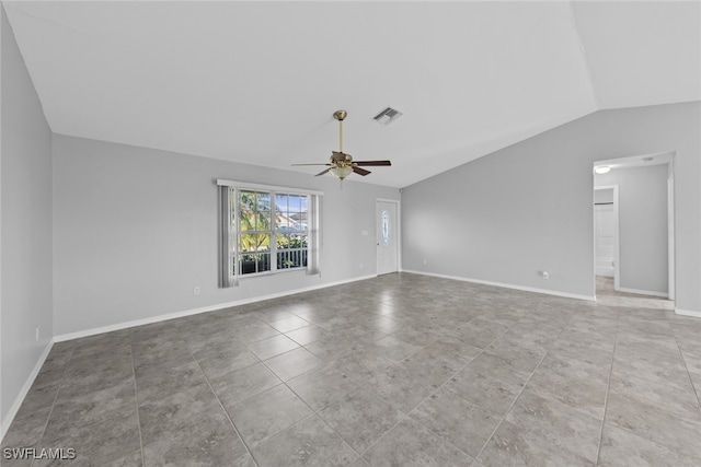 spare room with ceiling fan and vaulted ceiling