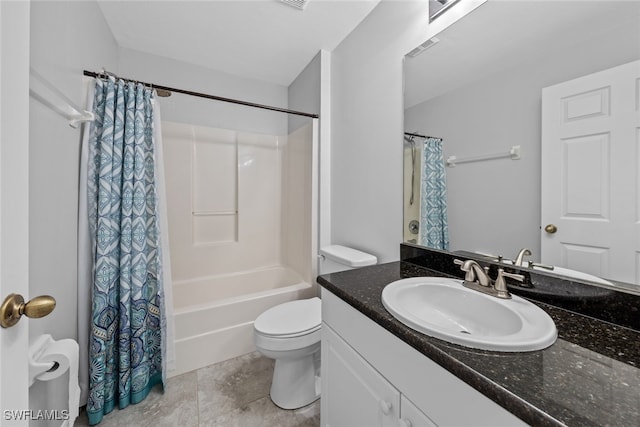 full bathroom with tile patterned floors, vanity, shower / tub combo, and toilet