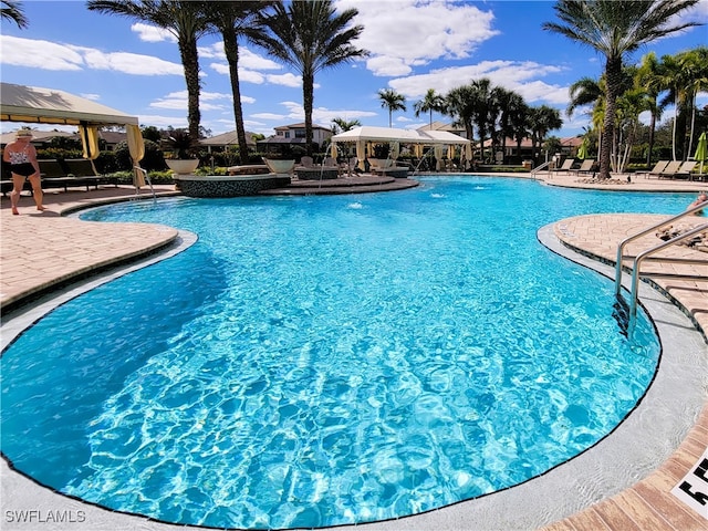 view of pool with a gazebo and a patio