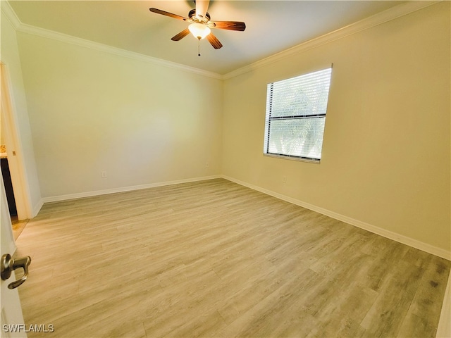 empty room with light wood-type flooring, ceiling fan, and ornamental molding