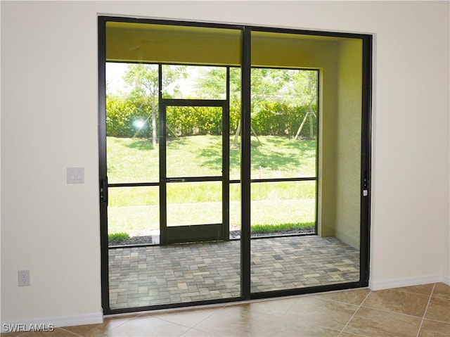 entryway featuring light tile patterned floors