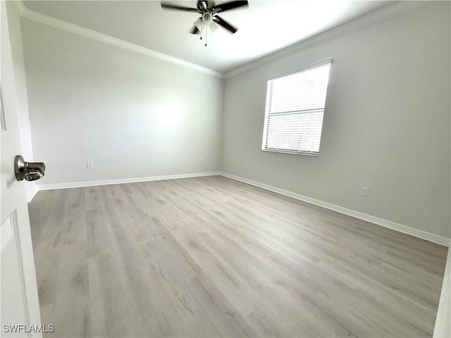 unfurnished room featuring ceiling fan, light hardwood / wood-style flooring, and crown molding