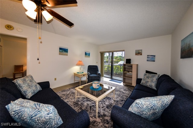 living room with hardwood / wood-style flooring and a textured ceiling