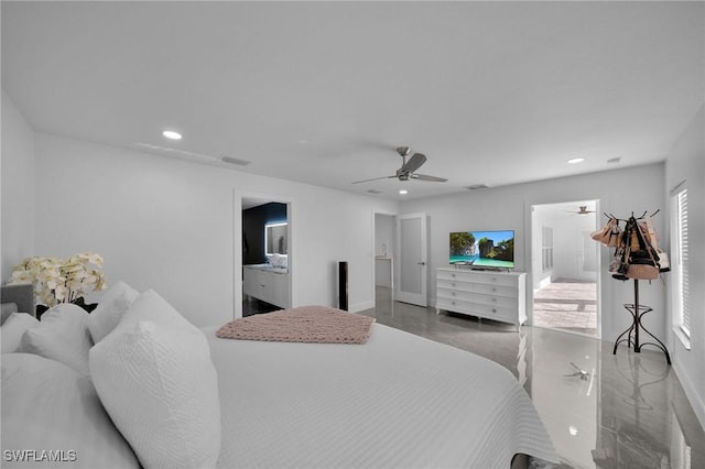 bedroom featuring ceiling fan and ensuite bath