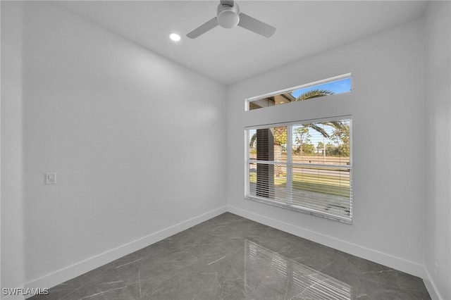 spare room featuring ceiling fan