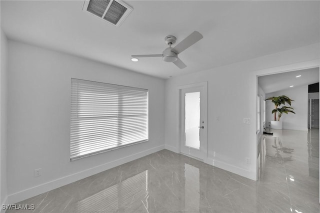 unfurnished room with ceiling fan