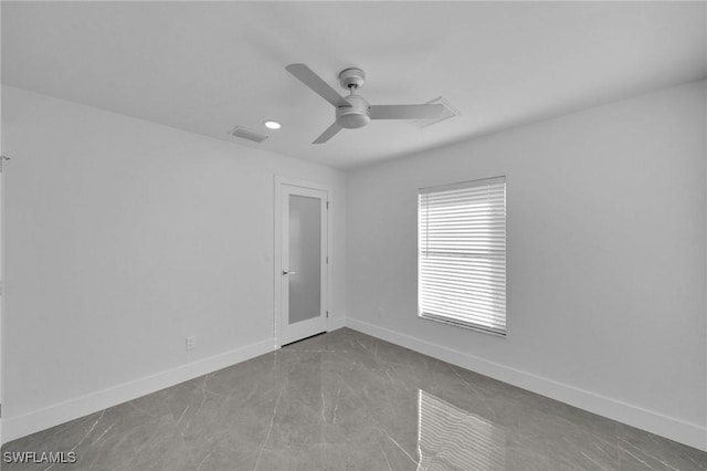 unfurnished room featuring ceiling fan