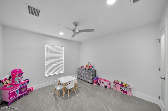 rec room with ceiling fan