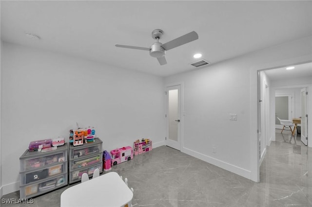 playroom featuring ceiling fan