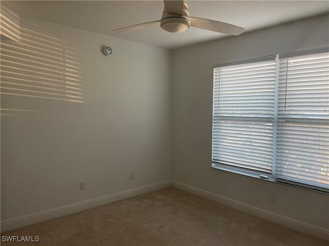 2876 Oleander St Unit D3, Saint James City, FL 33956 - carpeted spare room featuring ceiling fan and healthy amount of natural light