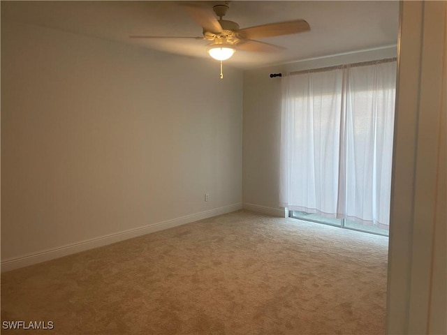 2876 Oleander St Unit D3, Saint James City, FL 33956 - unfurnished room with a ceiling fan and carpet
