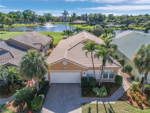 bird's eye view with a water view