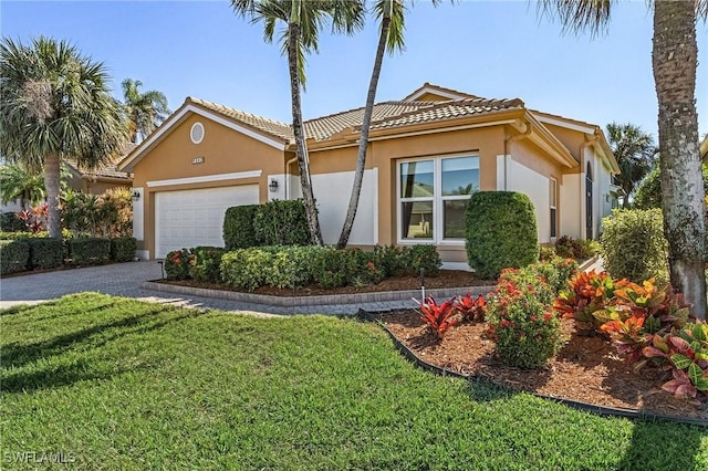 view of front of home with stucco siding, an attached garage, decorative driveway, and a front lawn