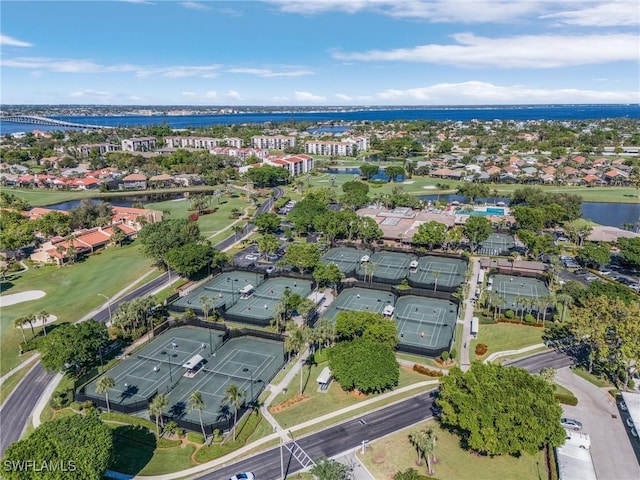 aerial view with a residential view and a water view