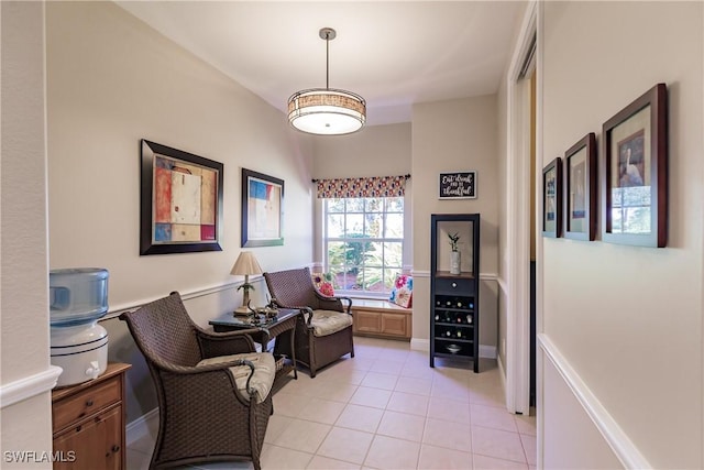 living area with light tile patterned floors