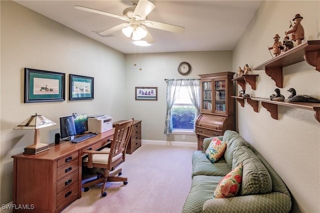 office area featuring ceiling fan and light colored carpet