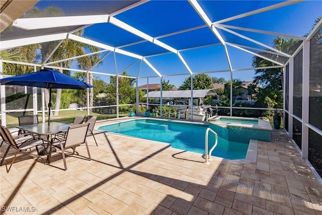 view of swimming pool with a lanai, a patio, and an in ground hot tub