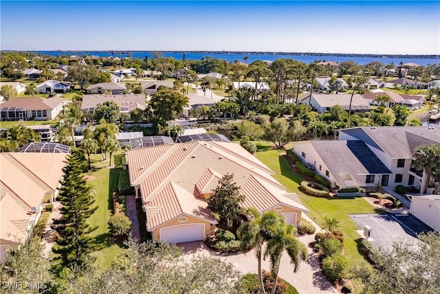 bird's eye view with a water view