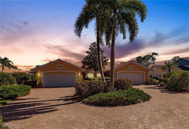 view of front of house with a garage