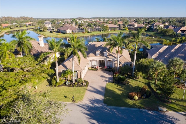 drone / aerial view featuring a water view