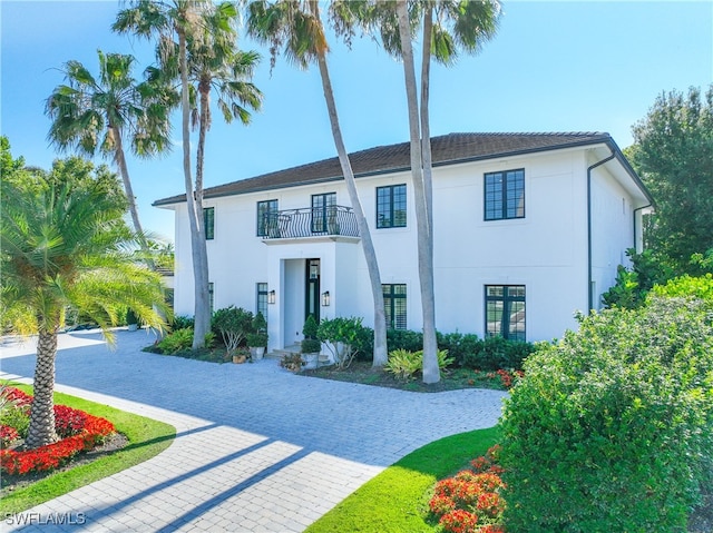 view of front of home with a balcony