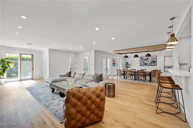 living room with light hardwood / wood-style floors