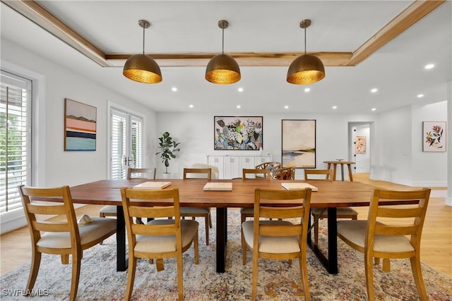 55 E Burning Tree Dr, Naples, FL 34105 - dining space with light wood-type flooring, a raised ceiling, and recessed lighting