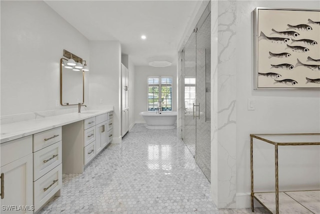 55 E Burning Tree Dr, Naples, FL 34105 - bathroom featuring vanity, a marble finish shower, a soaking tub, and recessed lighting