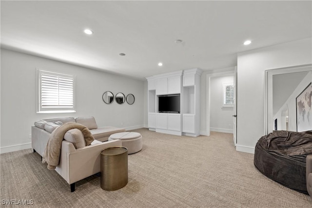 55 E Burning Tree Dr, Naples, FL 34105 - living area featuring light colored carpet, recessed lighting, and baseboards