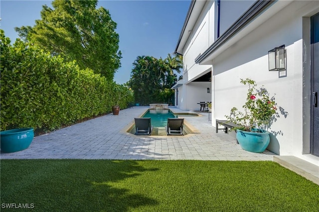 55 E Burning Tree Dr, Naples, FL 34105 - view of patio featuring an outdoor pool