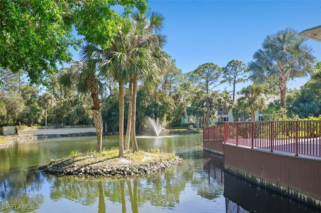 surrounding community with a water view