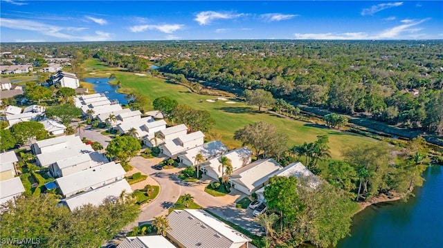 drone / aerial view with a residential view and a water view