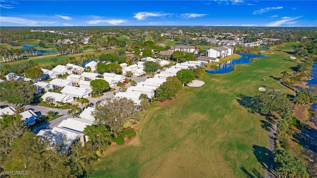 birds eye view of property featuring a residential view and a water view