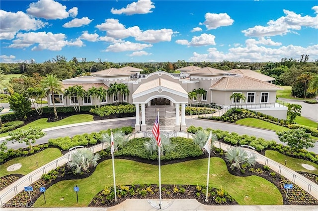 surrounding community featuring aphalt driveway, fence private yard, and a lawn